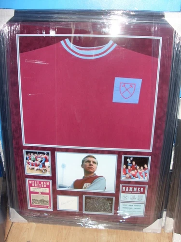 Sold: Bobby Moore Signed West Ham Shirt — 1966 World Cup Captain Autograph, Framed with COA