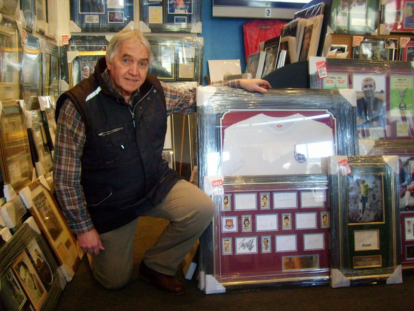 WDW Sporting Memorabilia - Owner with signed memorabilia collection
